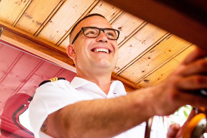 Amsterdam Small-Group Canal Cruise With Dutch Snacks and Drink - Westerkerk and the Anne Frank House from the water