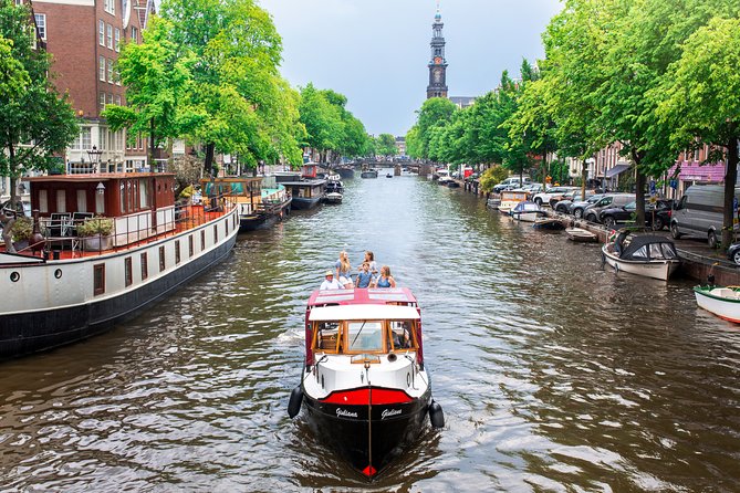 Amsterdam Small-Group Canal Cruise With Dutch Snacks and Drink - Waterlooplein, NEMO, and the maritime district