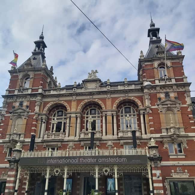 Amsterdam: Spanish Tour Unmasking the Redlight District - Zeedijk and Amsterdam’s port character