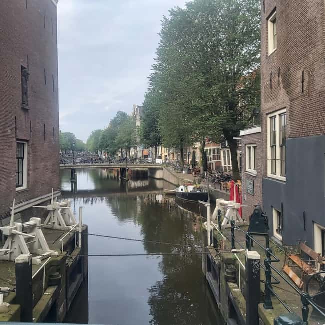 Amsterdam: Spanish Tour Unmasking the Redlight District - Oude Kerk, Amsterdam’s oldest building