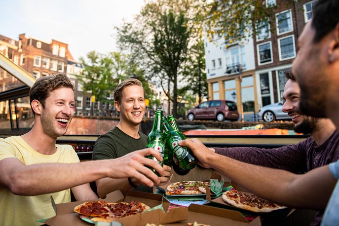 Amsterdam The Original Pizza Cruise with Unlimited Drinks - Cruising past Centraal Station and the Jordaan