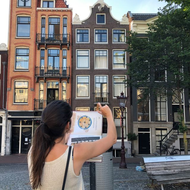 Amsterdam: Treasure Hunt Walking Tour "A Secret Sender" - Torensluis Bridge turns the walk into a city tour