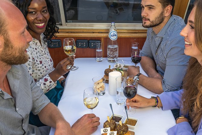Amsterdam Wine and Cheese Evening Cruise - The boat’s mood: peaceful evening or party outing
