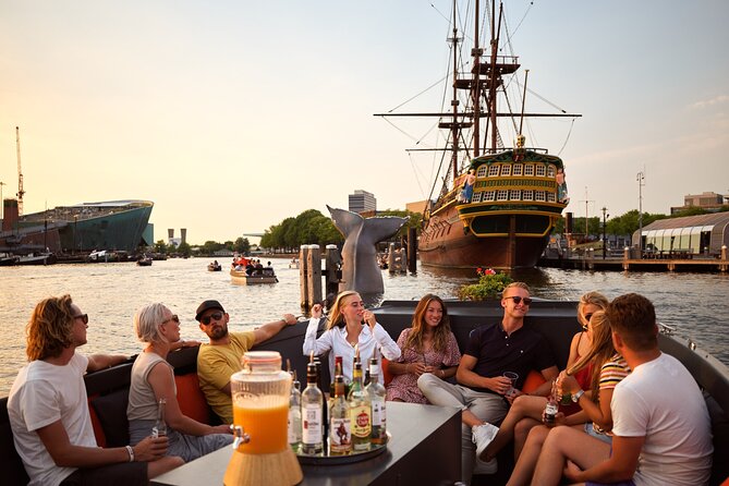 Classic Salonboat Tour in Amsterdam Including Cheese and Wine - Houseboats, the Nine Streets, and canal life