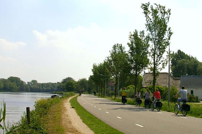 Countryside Bike Tour from Amsterdam: Cheese, Clogs & a Windmill - Waterland by bicycle, with canals and open pasture