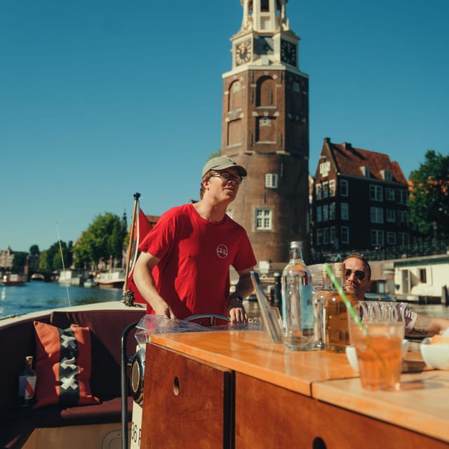 COZY AND FUN CANAL TOUR: A UNIQUE JOURNEY THROUGH AMSTERDAM - Starting beside Oudezijds Voorburgwal