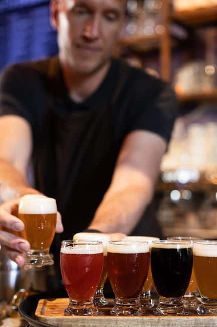 Delft: Craft Beer Tasting in Medieval Brewery with Snacks - Choosing between the cellar, garden, and brewery area