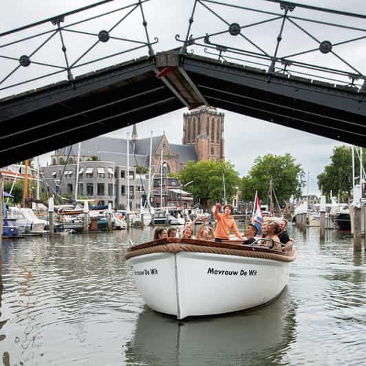 Dordrecht: City Canal Cruise - The City Hall and Great Church from the water
