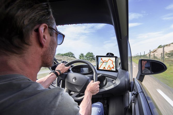 Drive it yourself electric Dutch Countryside GPS audio tour - Flower fields, windmills, and the short tulip season