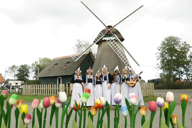 Dutch Experience in Volendam with Traditional Outfits - The photo beside the windmill