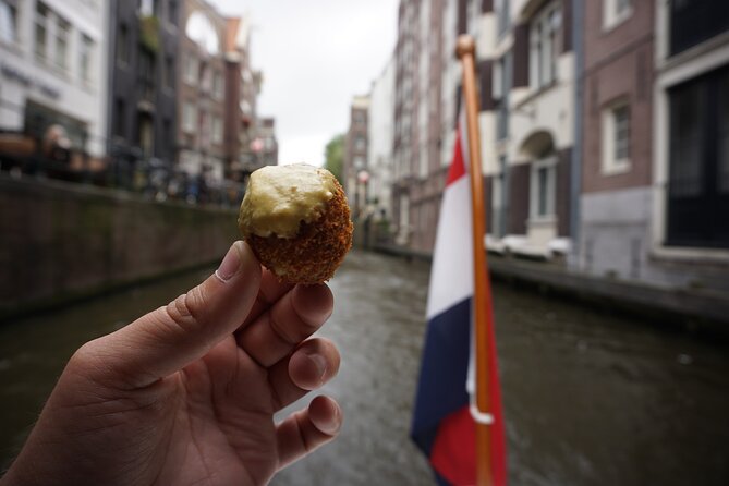 Eating Amsterdam: Food Tour & Canals Cruise - Four kinds of Gouda in a historic café