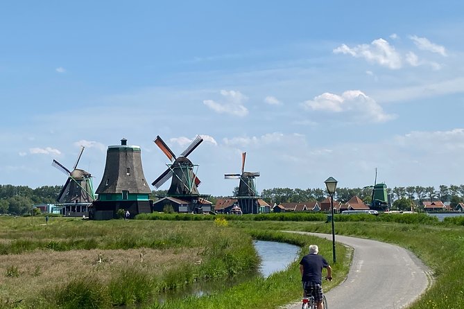 Escape Amsterdam: E-Bike to Zaanse Schans Windmills & Zaandam - Landsmeer: narrow paths and open fields