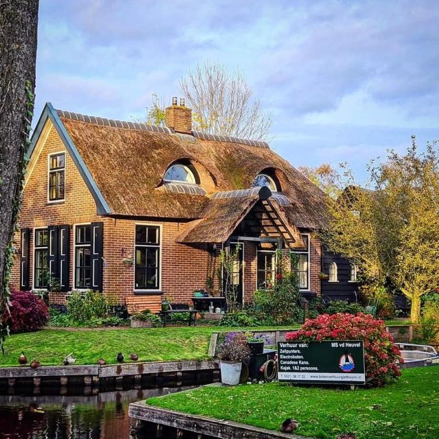 From Amsterdam: Giethoorn & Zaanse Schans Tour w/ Small Boat - Zaanse Schans: windmills, workshops, and a polished village