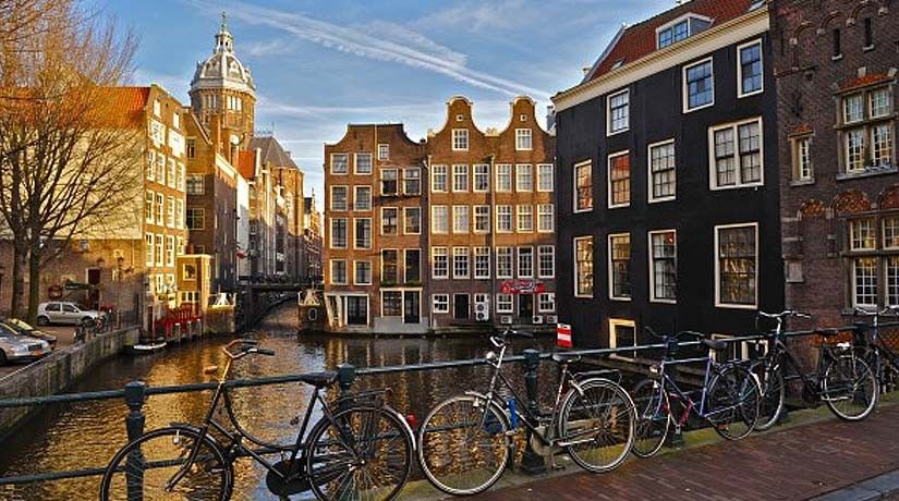 From Brussels: Day Trip to Amsterdam with Canal Boat Cruise - Three hours across Belgium and the Netherlands