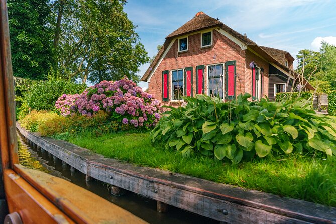 Giethoorn and Afsluitdijk Day Trip from Amsterdam with Boat Trip - The coach ride and group atmosphere