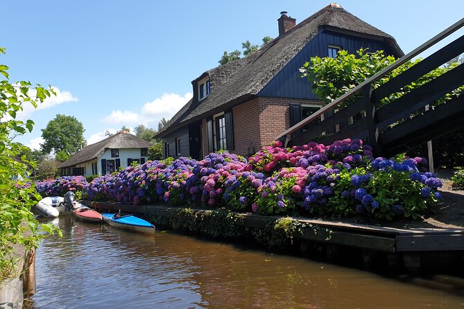 Giethoorn Day Tour from Amsterdam with Small Boat Ride - Price, group size, and practical value