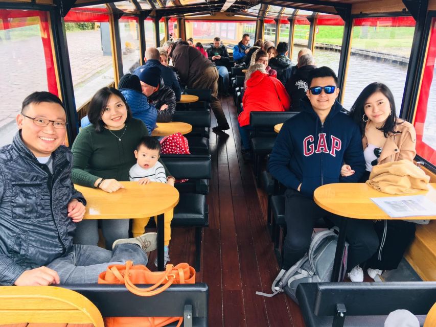 Giethoorn: Private Day Trip with Boat Tour from Amsterdam - Walking through canals, bridges, and farmhouses