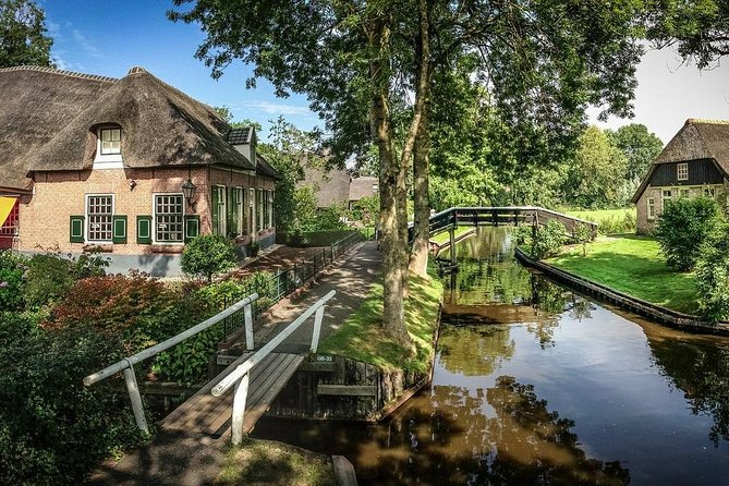 Giethoorn Private Tour, Canal Cruise and Windmills from Amsterdam - Zaanse Schans: windmills with working interiors