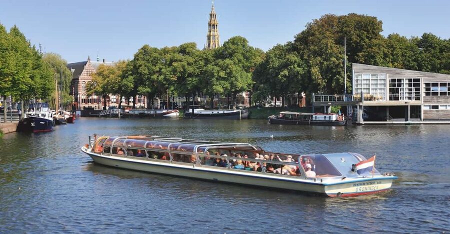 Groningen: City Canal Cruise - Martinitoren, Tasman Tower, and the city skyline