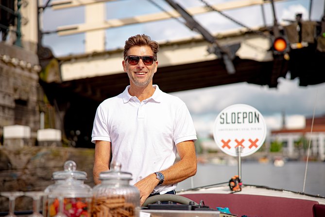 Guided Amsterdam Canal Cruise – Snacks & Drinks on board(1 Hour) - Drinks, Dutch cheese, and the open-air question