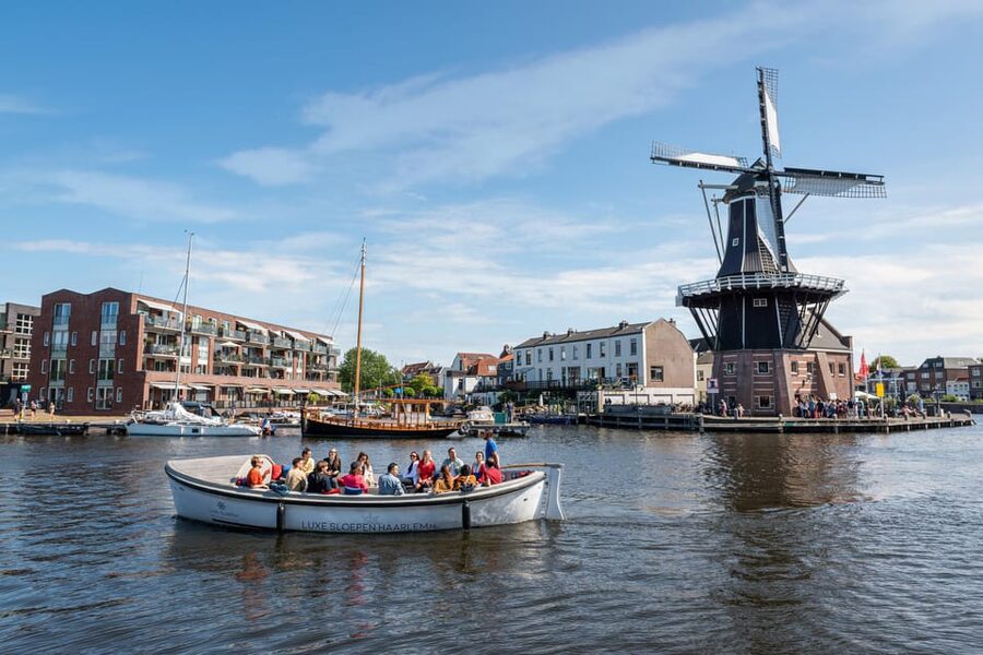 Haarlem: De Adriaan Windmill Tour + Open Canal Cruise - Boarding the open electric sloop