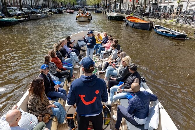 Highlights and Local Insights Canal Cruise Tour in Amsterdam - Ending beneath Magere Brug