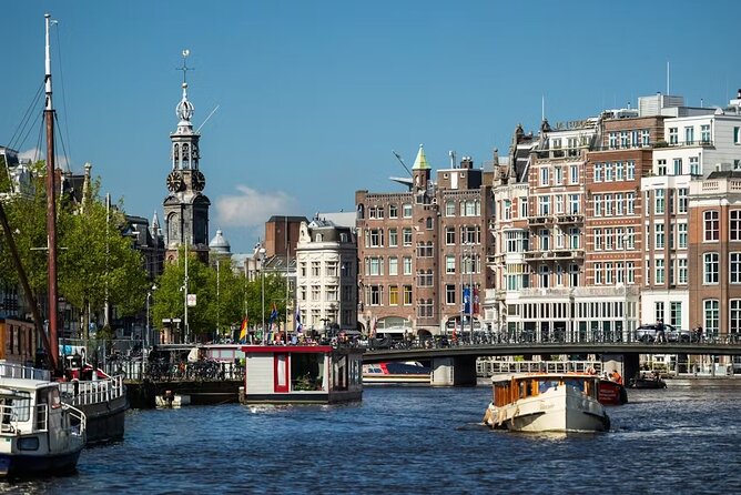 Highlights and Local Insights Canal Cruise Tour in Amsterdam - The Red Light District, Oude Kerk, and Amsterdam’s first coffee shop