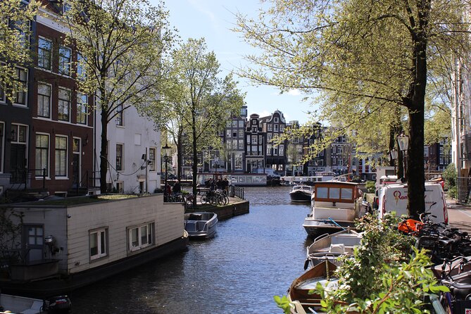 History & culture tour in Amsterdam with a local - Centraal Station, connection, and prosperity
