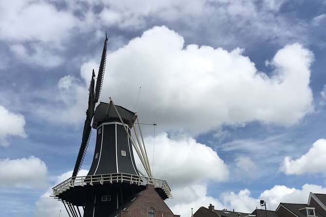 Holland Four City Charm Tour - Private Day Tour - Delft: canals, cobbles, and the House of Orange