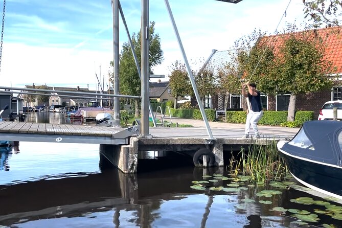 Interactive Sailing Day near Amsterdam - Three to four hours among polders, bridges, and windmills