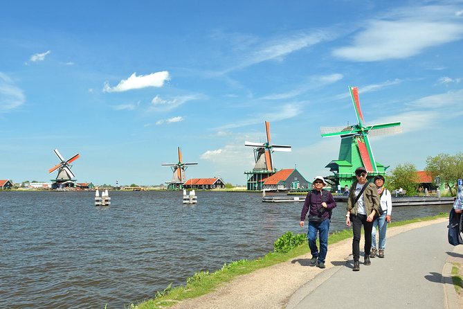 Keukenhof, Flower Fields, Volendam and Zaanse Schans Small-Group Tour - Volendam harbor, costumes, and lunch