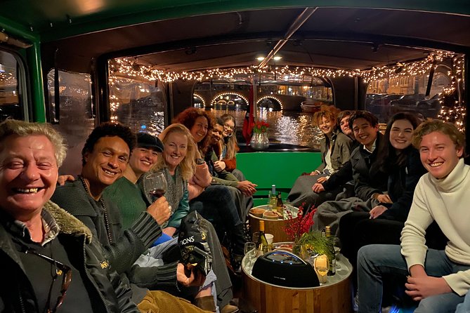 Light Event Amsterdam by small boat, 8 passengers max! You won't find any better - Following the illuminated canals for 90 minutes