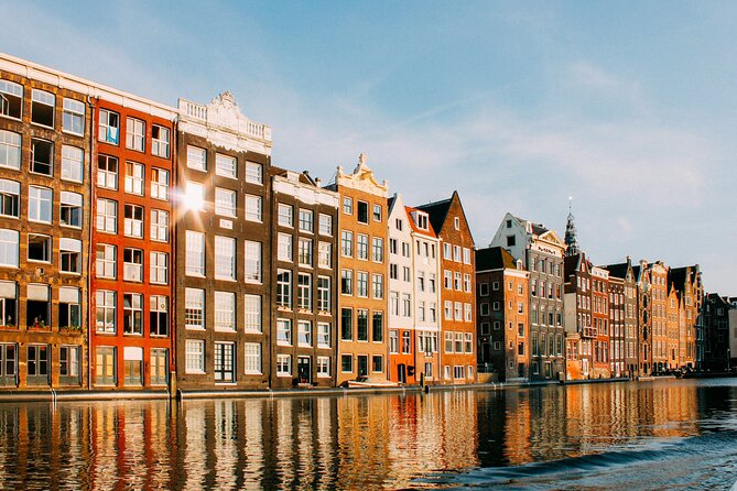 Personalized Hidden Gems of Amsterdam Private Tour with a Local - Old buildings, leaning facades, and St. Nicholas Basilica