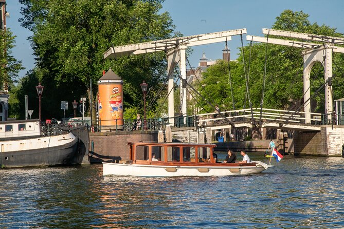Private Boat Tour Amsterdam - 90 Min incl. welcome drink on historic saloon boat - What you see during the nine passing points