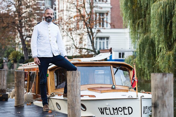 Private Champagne Canal Cruise in Amsterdam - Champagne, drinks, and snacks on board