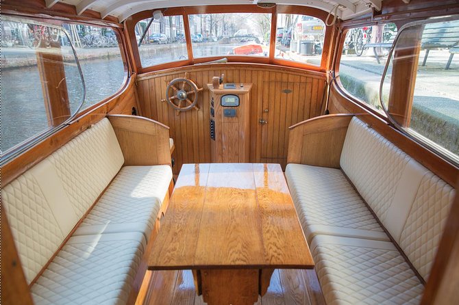 Private Champagne Canal Cruise in Amsterdam - The Amstel River, locks, and Amstel Hotel