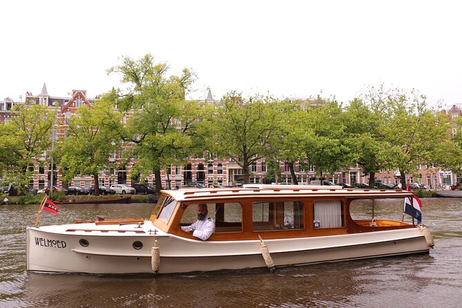 Private Guided Historic Amsterdam Canal Cruise in a Salon Boat - Rederij De Jordaan and the working canal setting