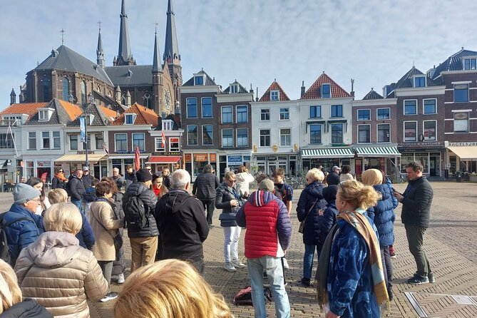Private Tour of Delft + Visit to Delft Blue Museum & Factory - Walking the Oude Delft canal to the Gemeenlandshuis