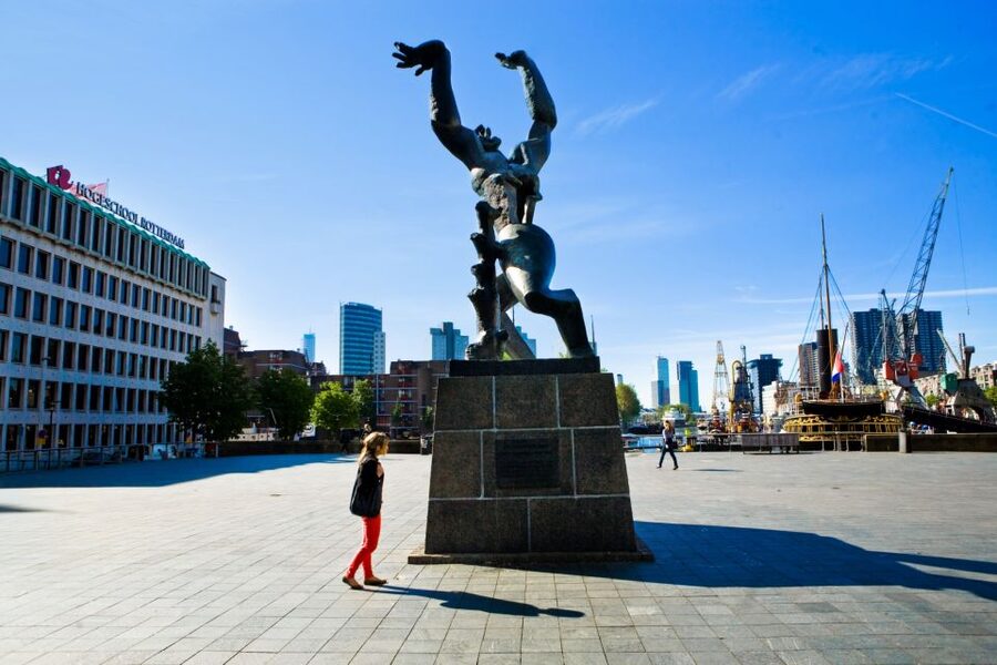 Rotterdam Walking Tour and Harbor Cruise - Market Hall brings food and housing under one roof