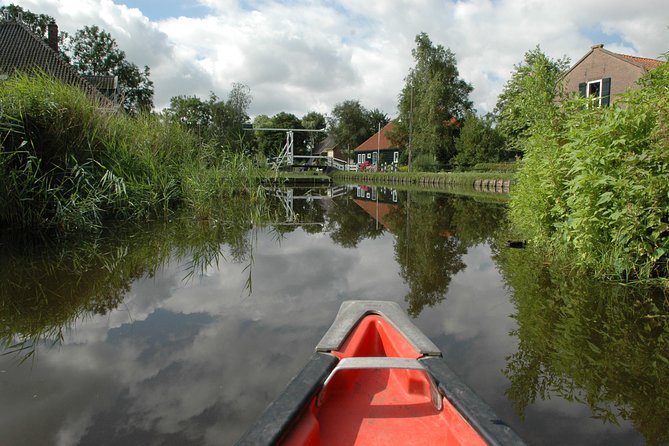 Small-Group Guided Sunset Canoe Tour in Waterland with Dinner - Sunset, swimming, and changing weather
