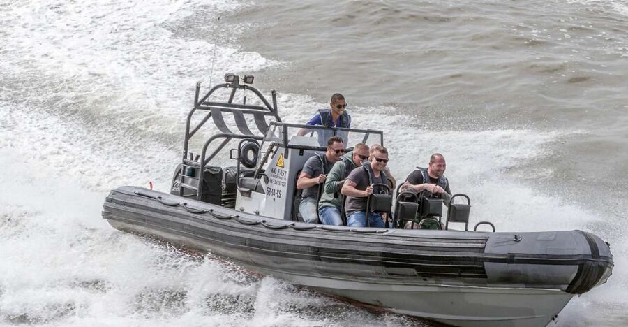 The Hague: Scheveningen Beach RIB Speedboat Tour - The lighthouse, harbor ships, and the view back to shore