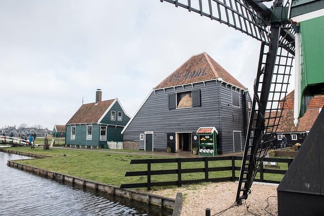 Visit Amsterdam Countryside with windmills by bike - De Schoolmeester and the story of Dutch paper