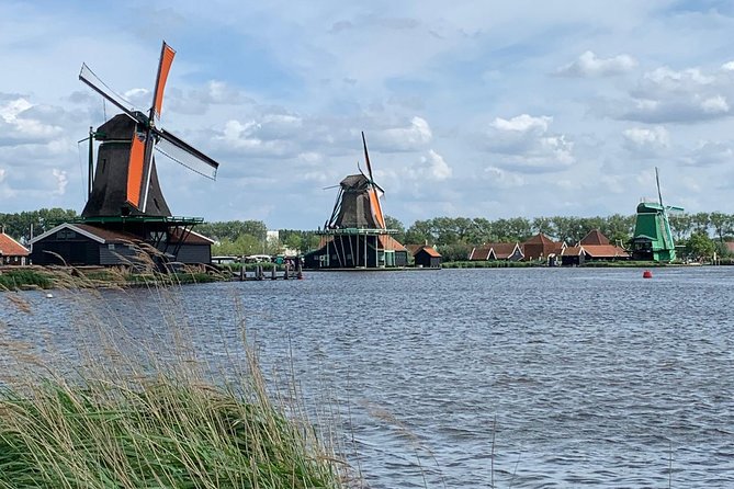 Visit Amsterdam Countryside with windmills by bike - Wet meadows, dikes, and the Dutch fight with water