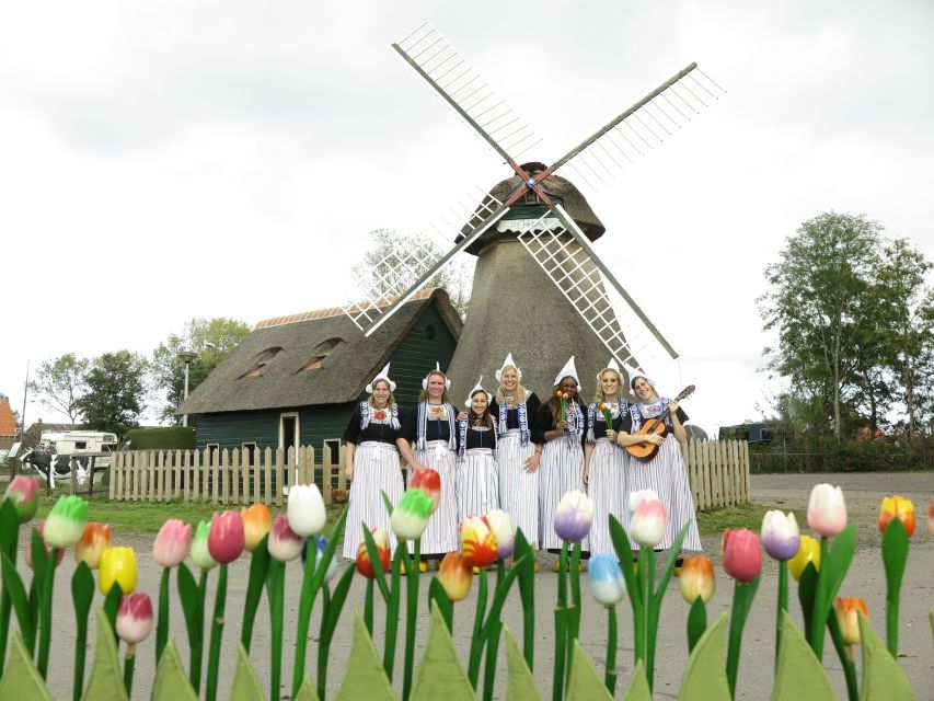 Volendam: Traditional Costume Photo with Cheese & Clog Tour - Seeing cheese made the Dutch way