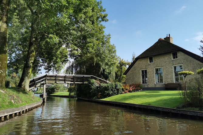 Zaanse Schans and Giethoorn Small-Group Tour with Hotel Pick-Up - Wooden shoes, tools, and a quick photo stop